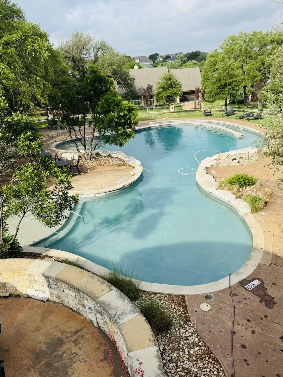 Finished Belle Pools property with a clean swimming pool